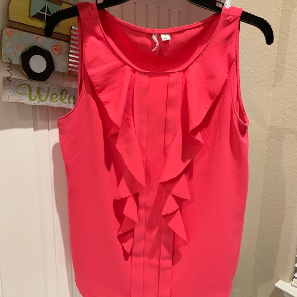Hot pink sleeveless blouse